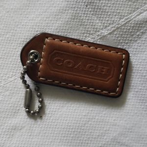 COACH Tan Bag Tag Brown